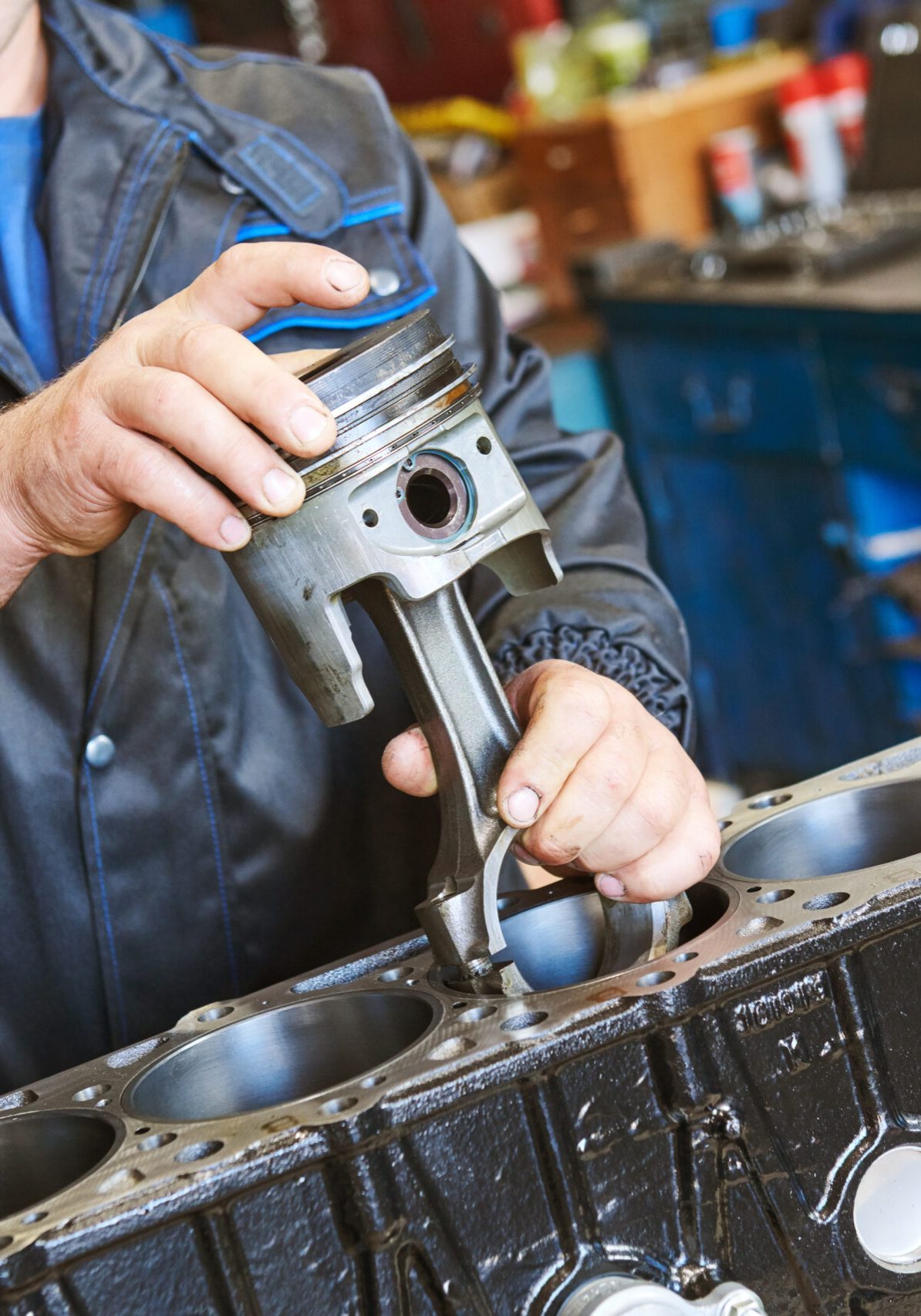 Diesel,Truck,Engine,Repair,Service.,Automobile,Mechanic,Installing,Piston,Into Diesel,Truck,Engine,Repair,Service.,Automobile,Mechanic,Installing,Piston,Into